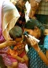At home doing community outreach in India.