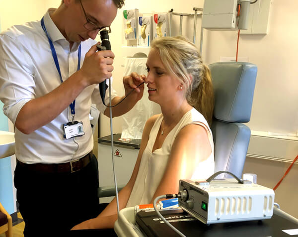 Comparison photo of two designs of flexible nasendoscope.