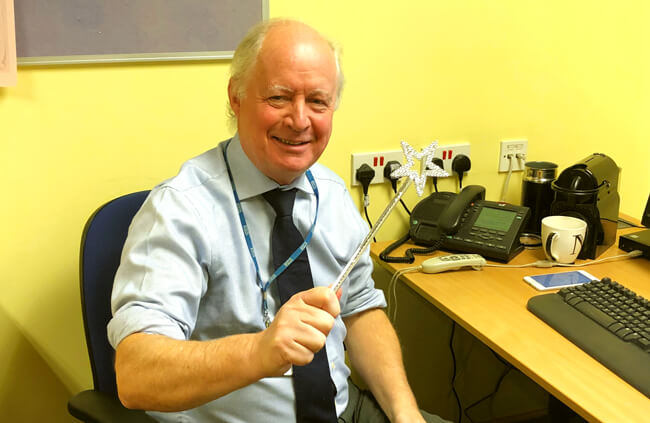 Photo of Gerry preparing to bring a little magic to BACO 2020