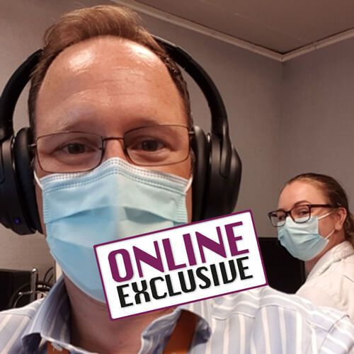 Photo showing Gareth Smith and Kirsten Ellis sampling the PuroPro headphones with Online Exclusive stamp.