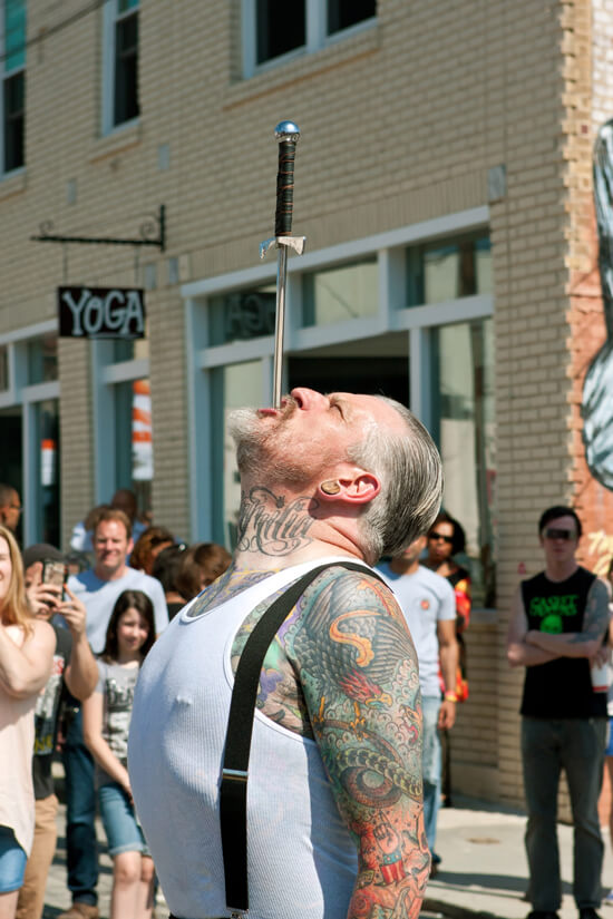 Photo of sword-swallower