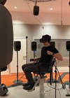 Photo showing example of person using VR.