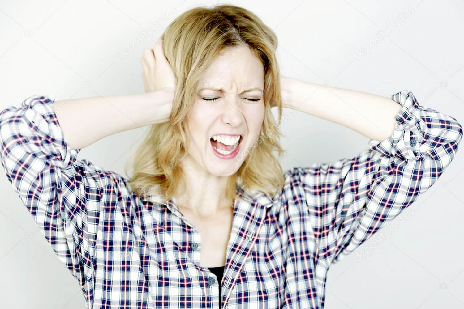 Photo of woman screaming.