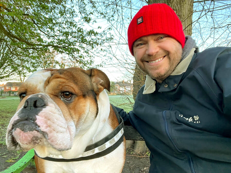 Photo of Christian Macutkiewicz with dog.