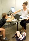Photo showing Philippa James and a patient of the Autism Listening Clinic, the University of Melbourne.
