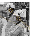 Image showing smart hearing protection worn by operatives at risk of noise exposure.
