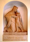 Photo showing statue of St Blaise, which was in the lobby of the Royal National Throat Nose and Ear Hospital.