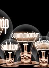 Photo showing lightbulbs with leadership words. 