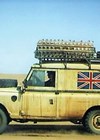 Photo showing Landrover crossing the Sahara during a trans Africa road trip.