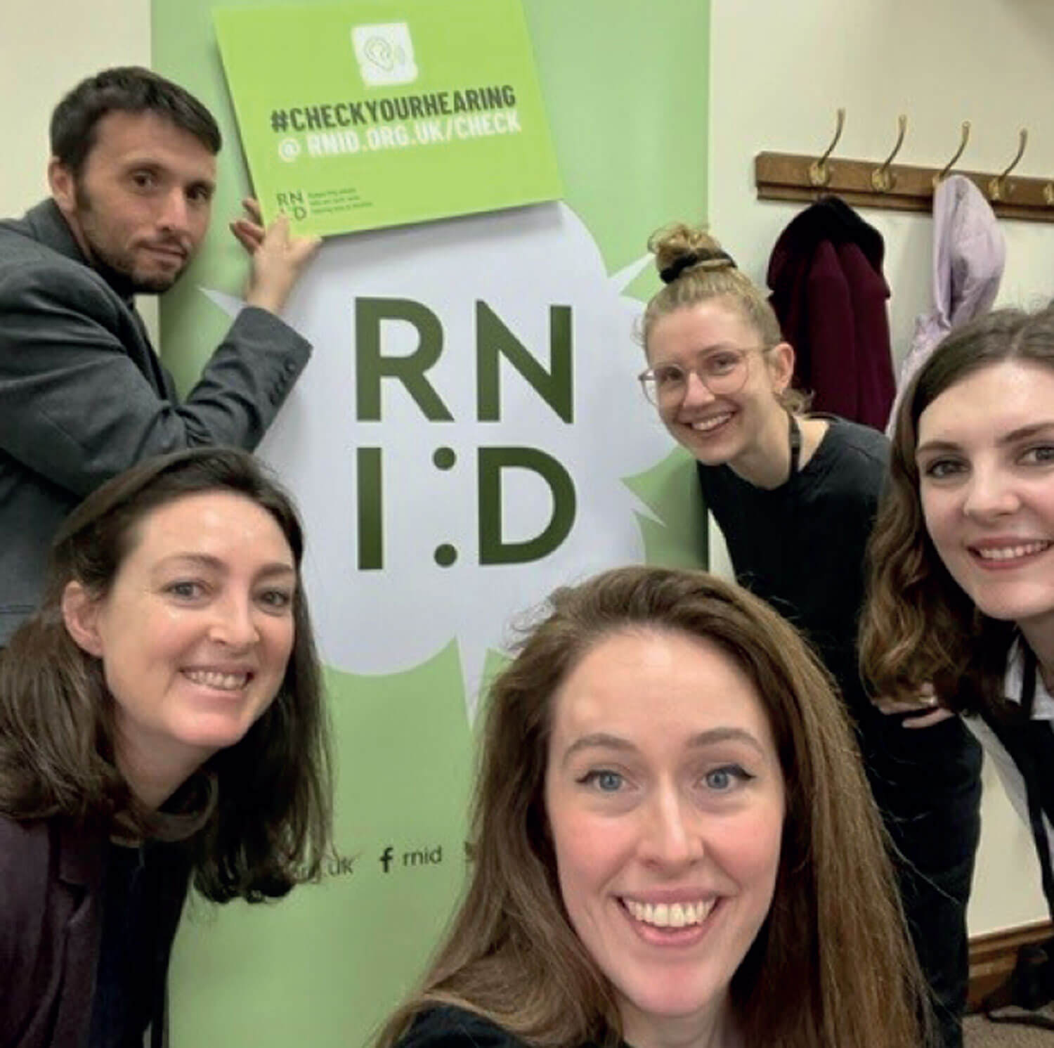 Franki Oliver with RNID colleagues at Westminster. 