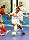 Photo of Zara Musker playing in the Deaf European Futsal finals. 