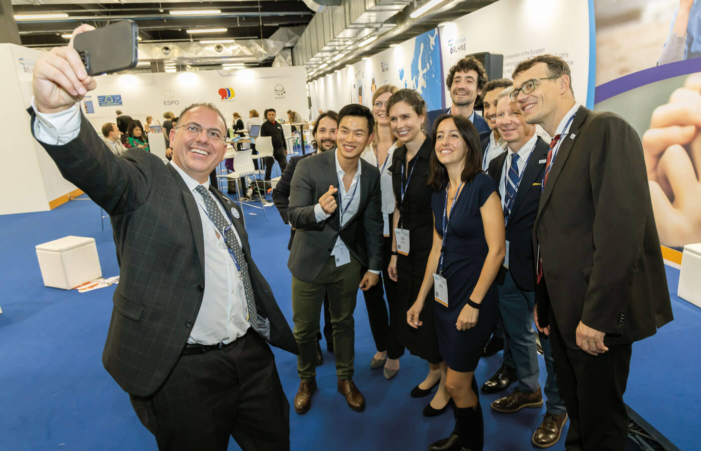 Photo showing Some members of the Young Confederation joining Congress President Cem Meco for a selfie at the 2022 CEORL-HNS meeting in Milan.