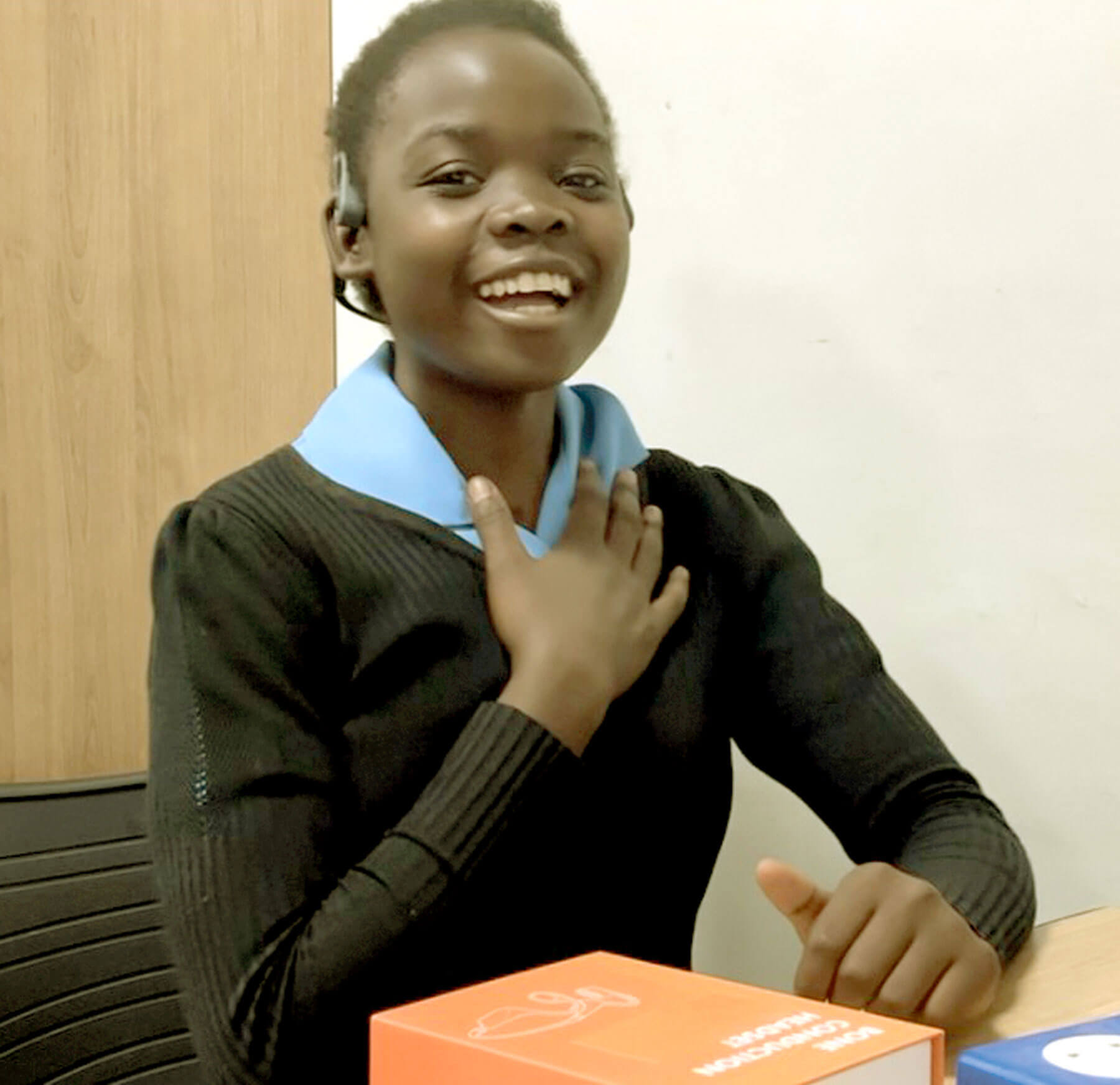 Photo showing child with conductive loss wearing the bone conduction headset.