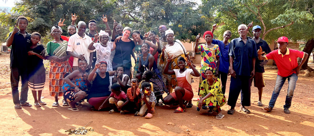 Photo showing Annelies with the deaf people from Adamorobe, Ghana.