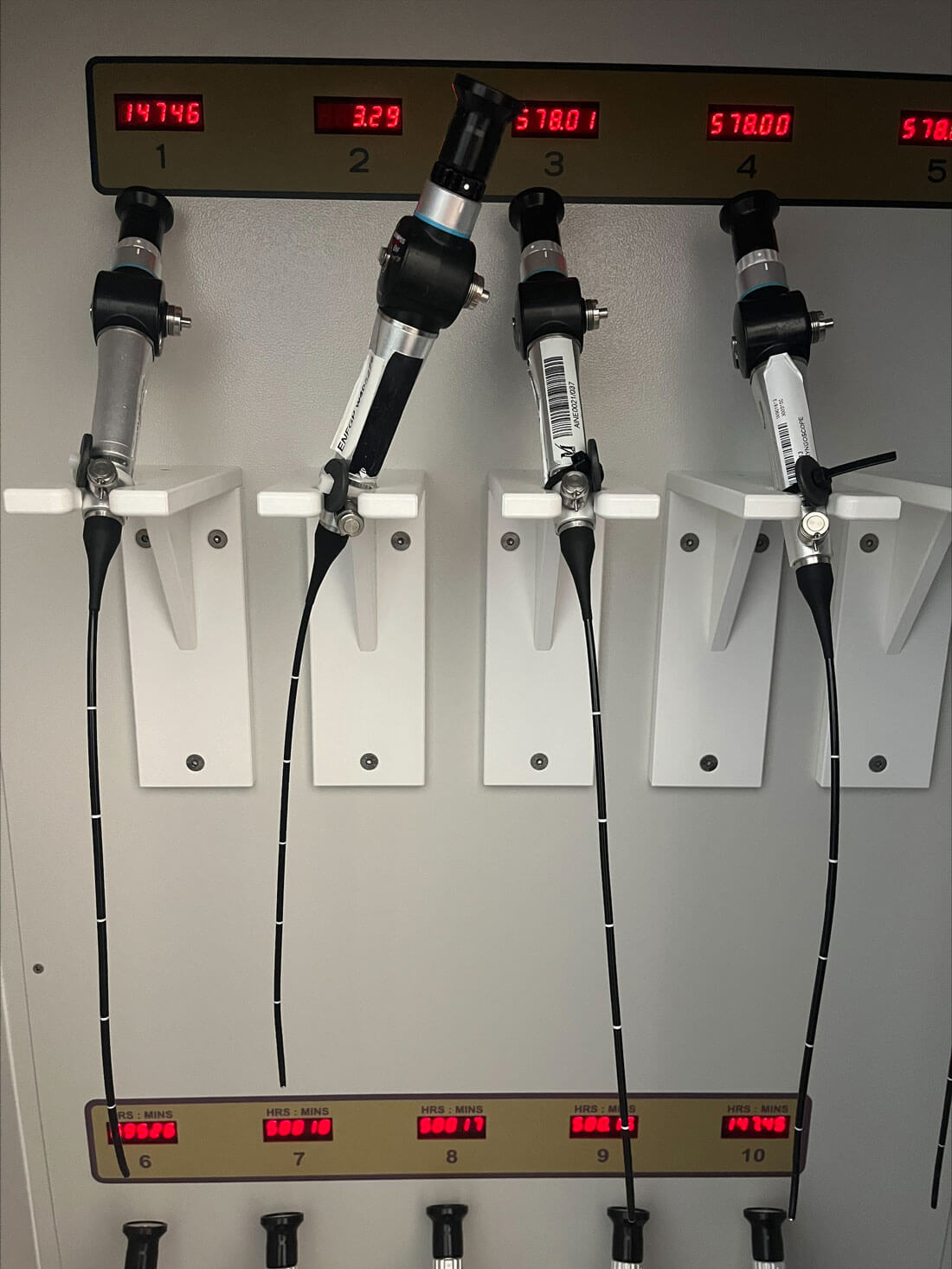 Photo showing sterile endoscope storage cabinet for reusable flexible nasendoscopes.