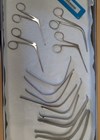 Photo showing reusable metal ENT instruments in tray.