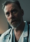 Photo of doctor in conversation.