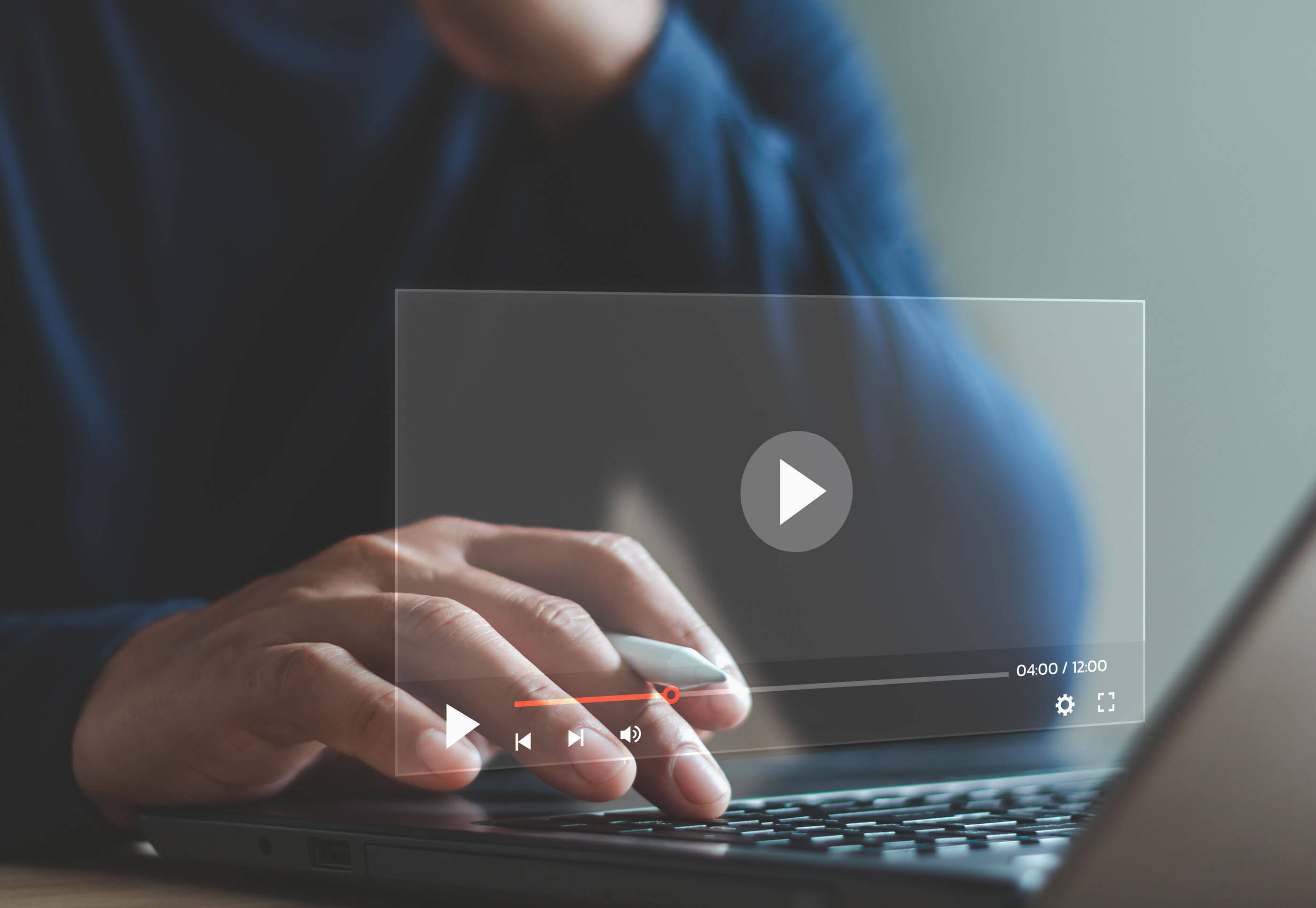 Photo of person at laptop computer.