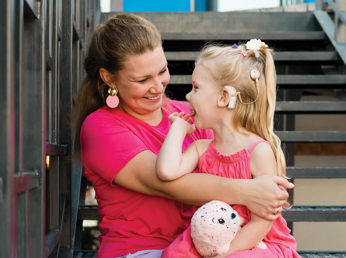 Photo of adult with child.